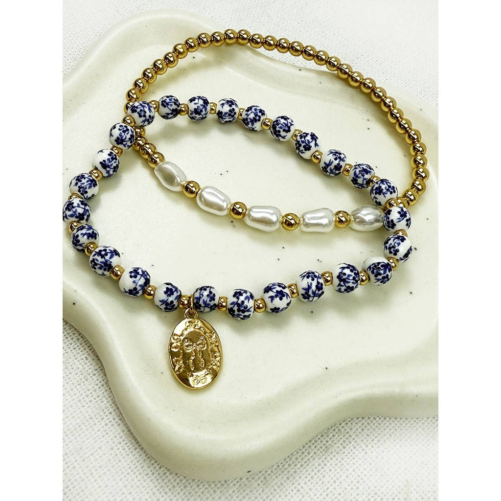 Blue Oval Metal Charm with Cermamic Bead Bracelet